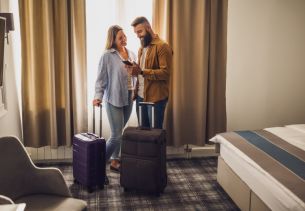 A couple in a Hotel room