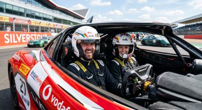 Couple in a supercar on a driving experience day