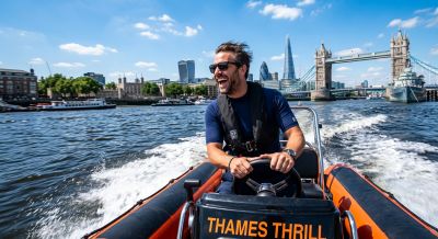 Man driving a speedboat in London