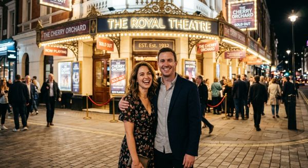 Someone standing outside a theatre