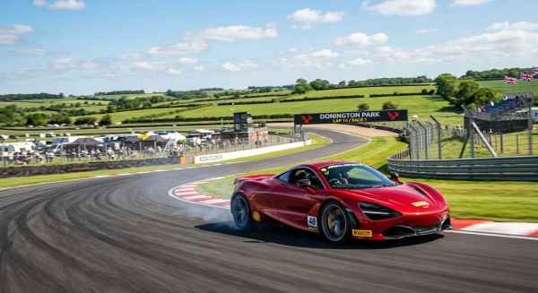 Red supercar on a UK racing track