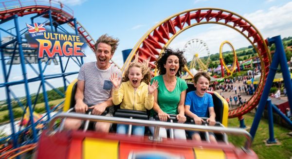 A family enjoying a thrilling rollercoaster ride at a theme park