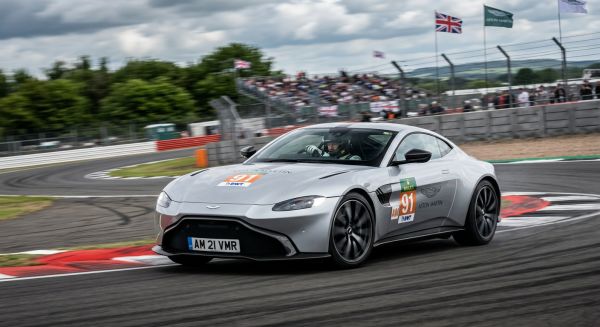 Aston Martin driving experience on a track, with a man on the experience