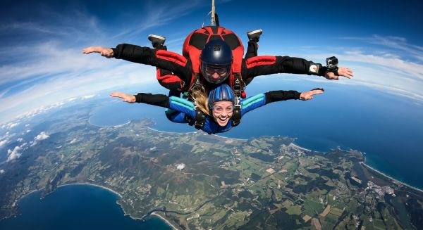 Tandem skydiving pair in freefall