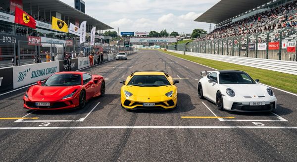 Lineup of Ferrari, Lamborghini, and Porsche supercars
