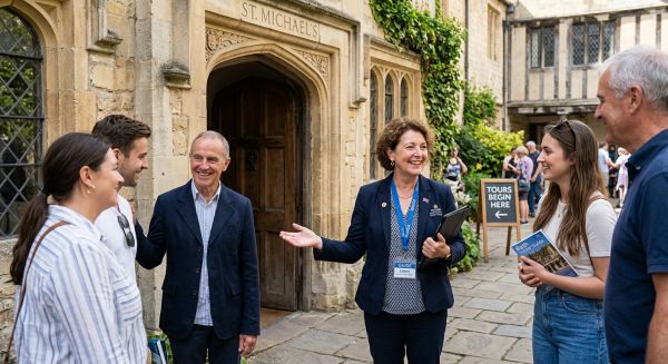 Tour guide welcoming guests to an experience day
