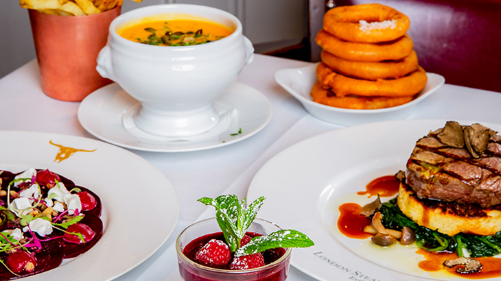 Marco Pierre White restaurant steak and gourmet dishes served on white tablecloth fine dining experience