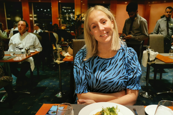Matt's partner enjoying dinner on the Sunborn
